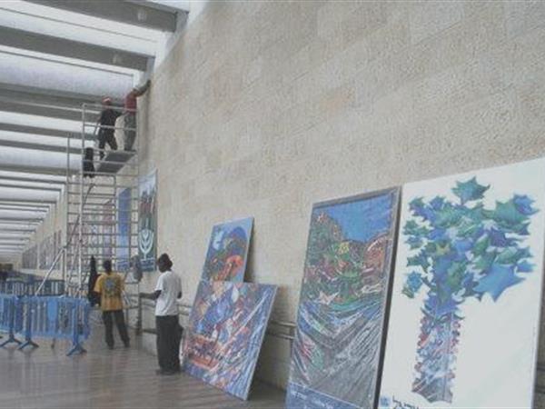 Setting up an Independence Day Posters Exhibition in the Connector.